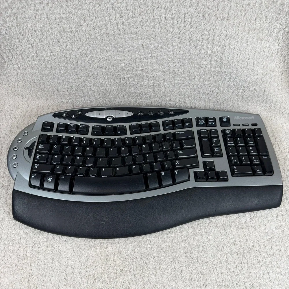 Microsoft Wireless Comfort Keyboard 4000 Ergonomic USB Model 1045 Silver Black‎